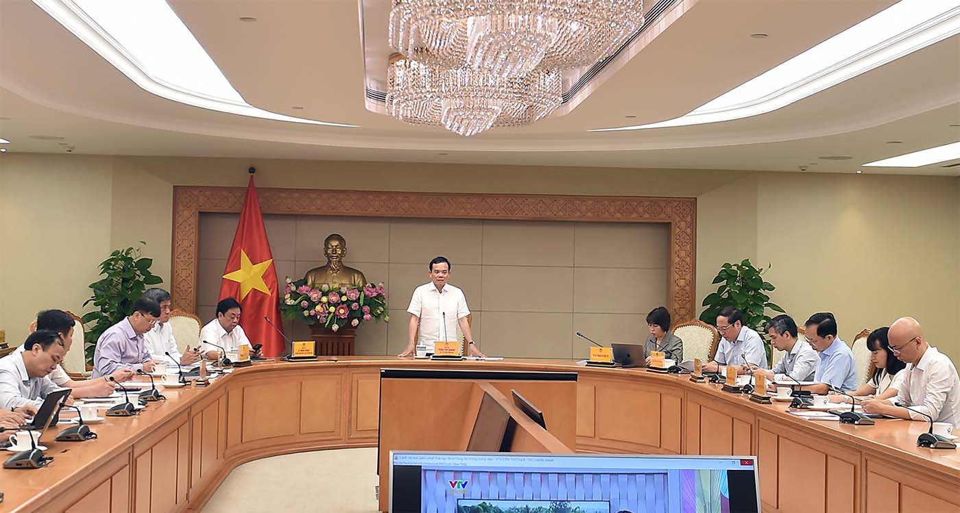 Cuộc họp nghe báo cáo về tiến độ triển khai Đề án 1 triệu ha lúa chất lượng cao, phát thải thấp. Ảnh: Hải Minh