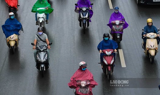 Dự báo thời tiết Hà Nội đêm và sáng sớm có lúc có mưa. Ảnh: Tô Thế