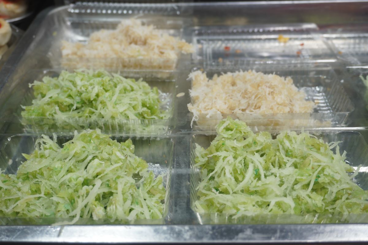 Tapioca cake with eye-catching pandan leaf color.