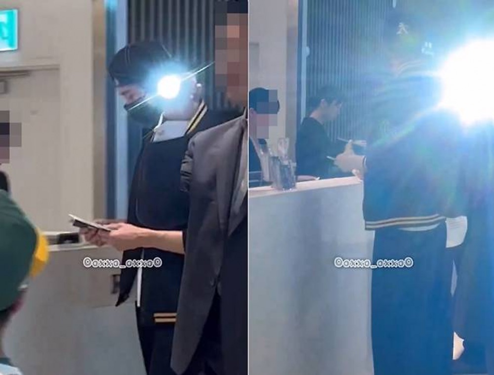 Byeon Woo Seok's bodyguard shines a light on the other passengers. Photo: Naver