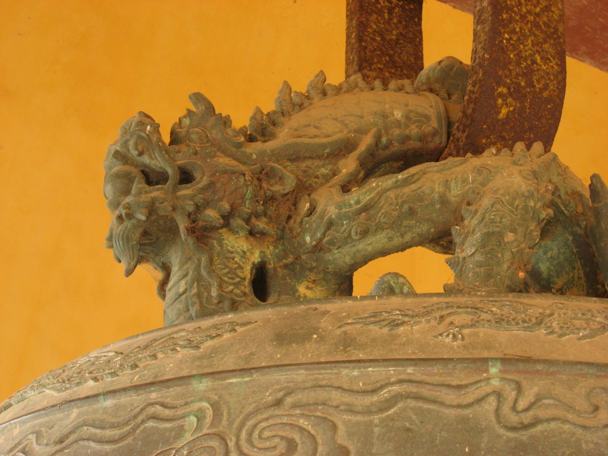 Close-up of decorative motifs on the bell of Thien Mu Pagoda.