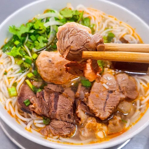 Mrs. Dieu's beef noodle soup makes a difference because of the strong onion smell in the broth and diverse toppings