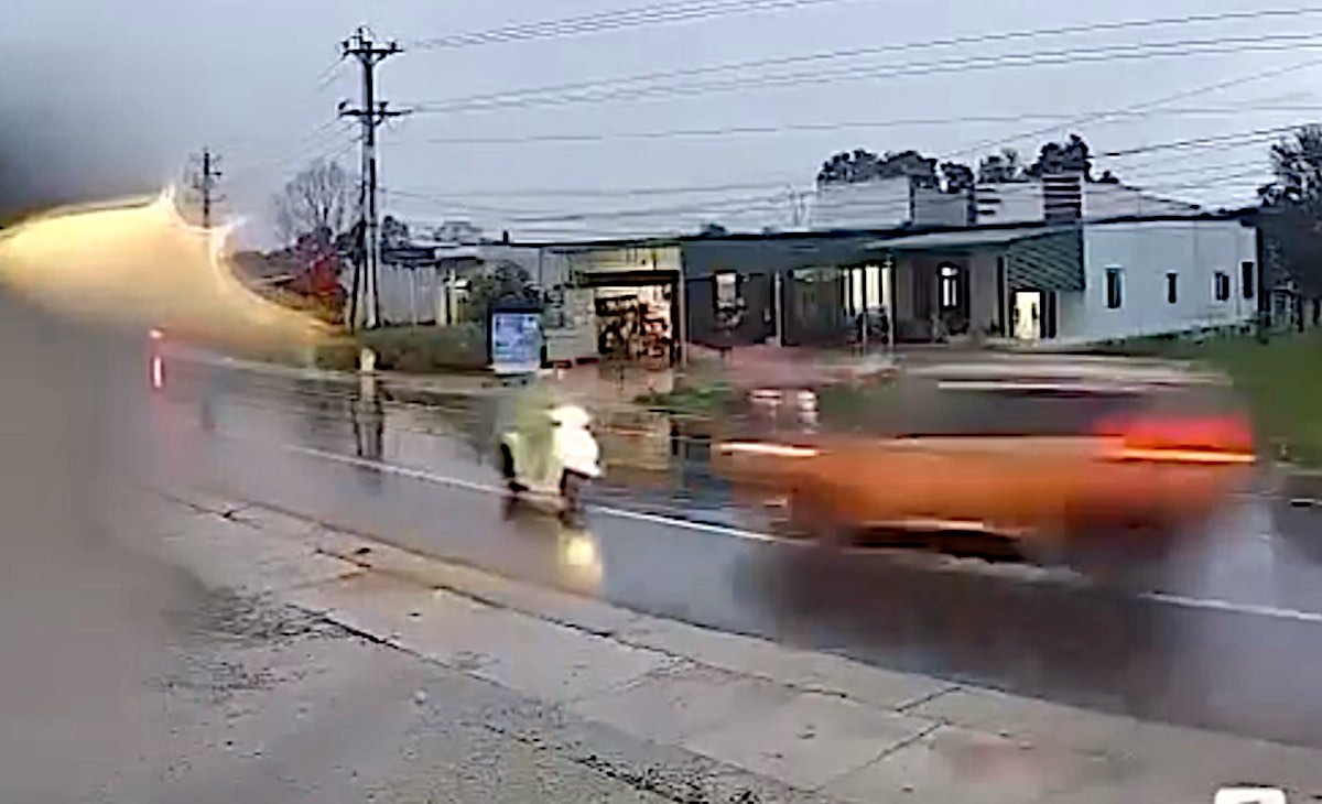 The camera records the moment of collision between a car and a motorbike. Photo cut from camera