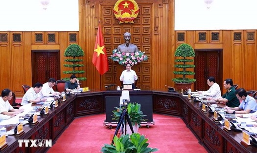 Thủ tướng Chính phủ Phạm Minh Chính chủ trì họp về tình hình thi công dự án đường dây 500 kV mạch 3. Ảnh: Dương Giang