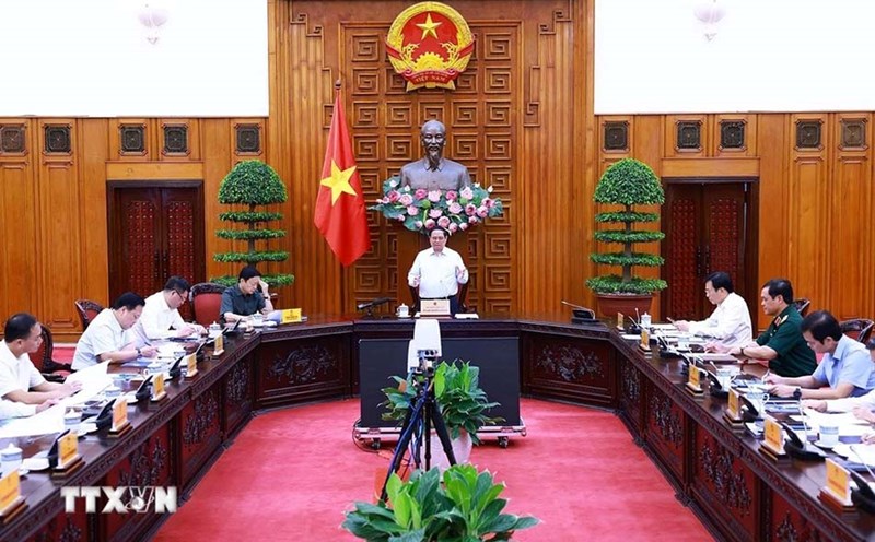Thủ tướng Chính phủ Phạm Minh Chính chủ trì họp về tình hình thi công dự án đường dây 500 kV mạch 3. Ảnh: Dương Giang