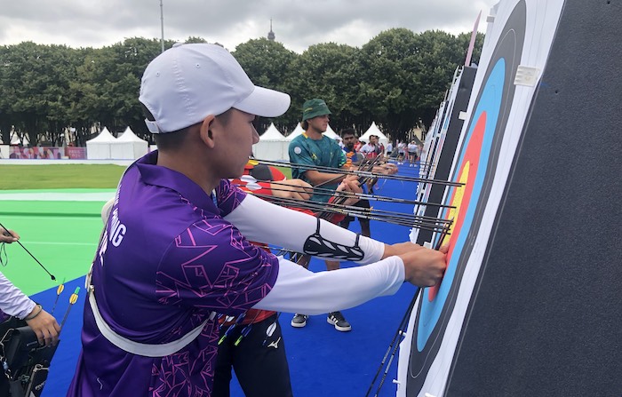 Archer Le Quoc Phong practices before competition day. Photo: Thu Sam