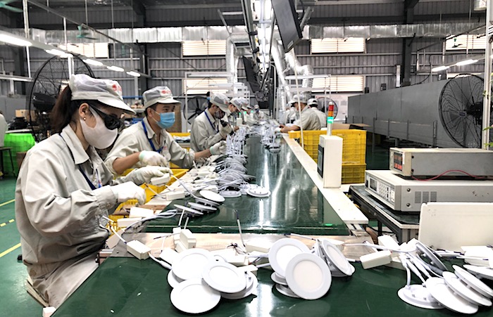 Người lao động trong một doanh nghiệp ngành Công Thương. Ảnh: Hà Anh