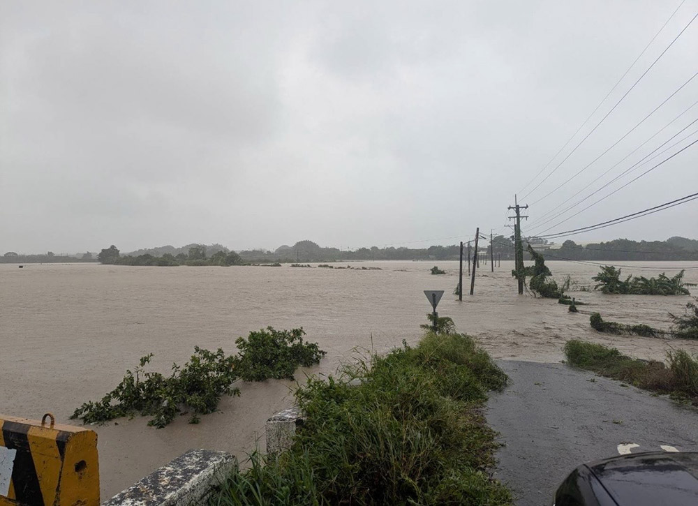 River water flooded the road in Hau Bich area, Tainan city, Taiwan (China) on July 25. Photo: Tainan City Government/CNA