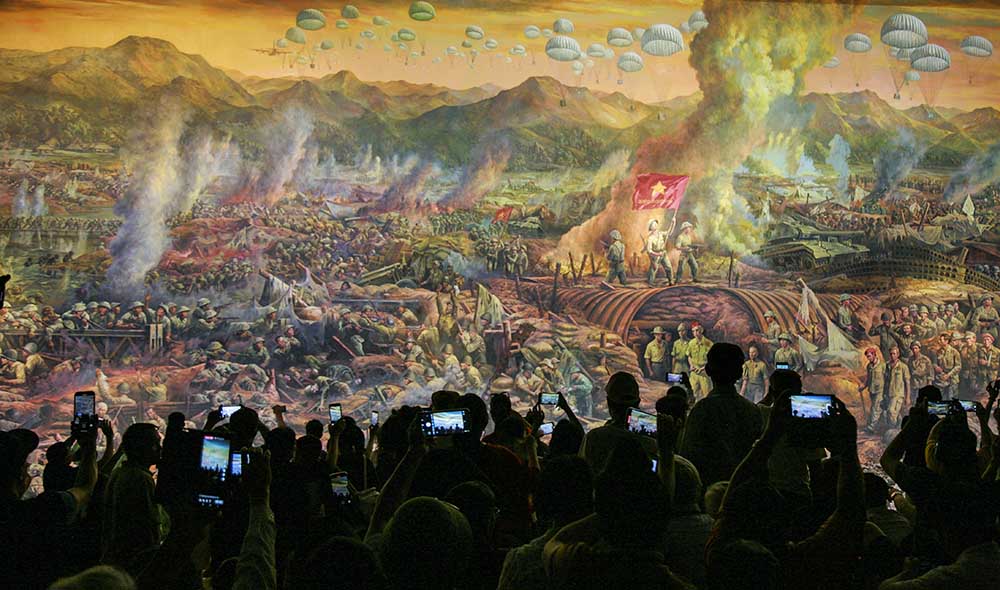 Tourists visit the panorama painting at the Dien Bien Phu Historical Victory Museum. Photo: Van Thanh Chuong