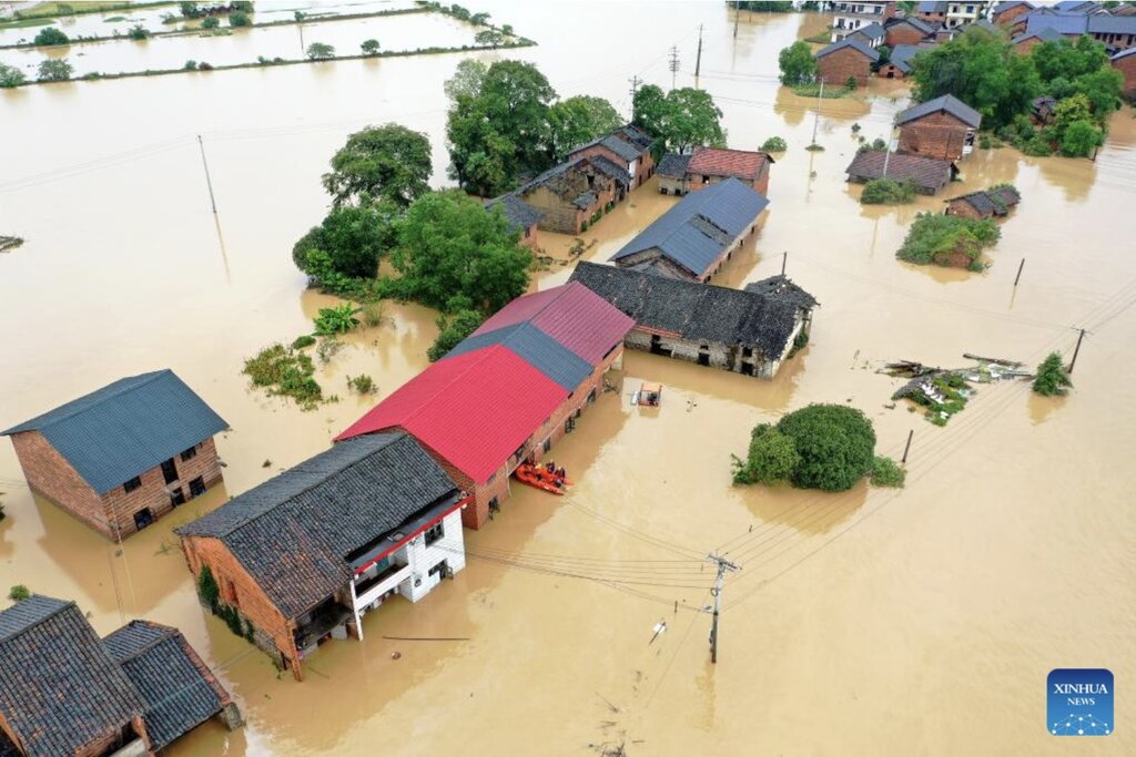 Tàn dư của bão số 3 Gaemi mang mưa lớn tới nhiều nơi ở tỉnh Hồ Nam, miền trung Trung Quốc. Ảnh: Xinhua