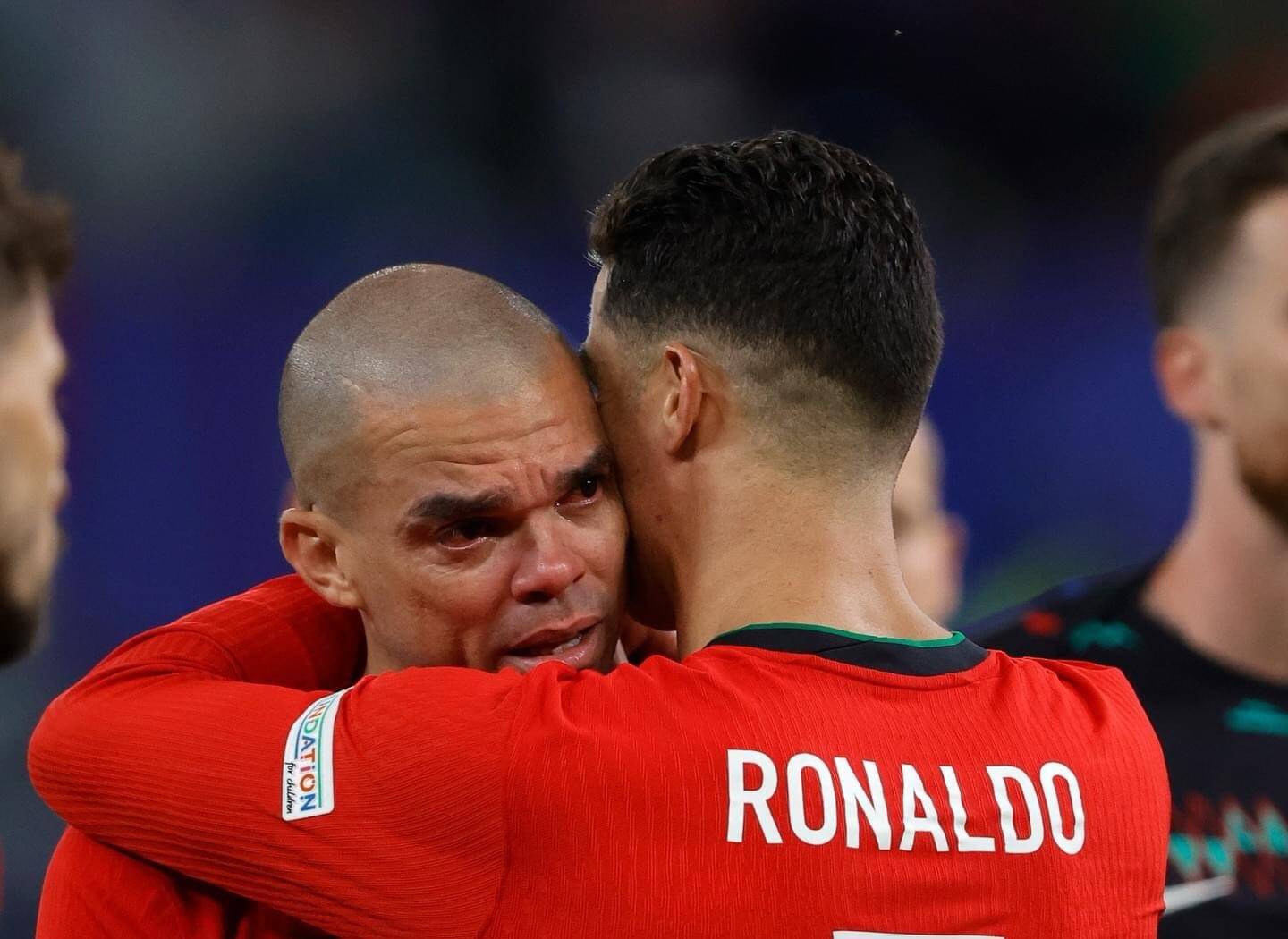 Ronaldo comforts Pepe after defeat to Portugal. Photo: UEFA