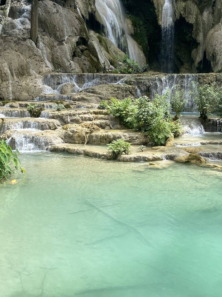 Kuang Si Waterfall is famous for its beautiful emerald green water. Photo: NVCC