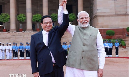 Thủ tướng Chính phủ Phạm Minh Chính và Thủ tướng Ấn Độ Narendra Modi. Ảnh: TTXVN