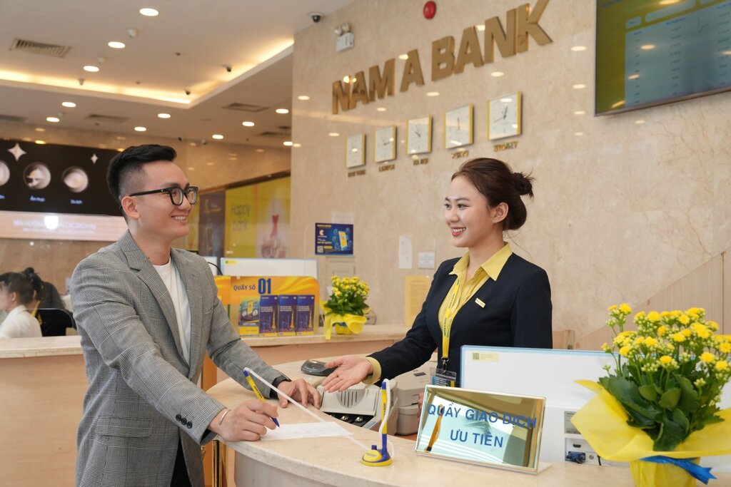 Customers make transactions at Nam A Bank.