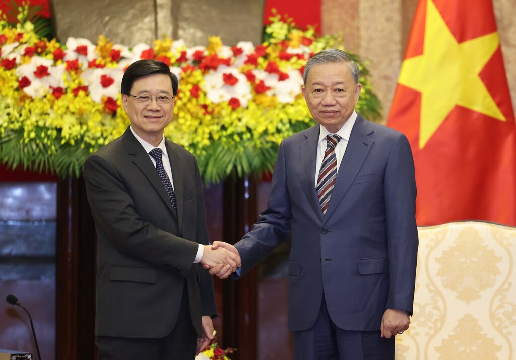 Chủ tịch nước Tô Lâm và Trưởng Khu hành chính đặc biệt Hong Kong (Trung Quốc) Lý Gia Siêu. Ảnh: Hải Nguyễn 