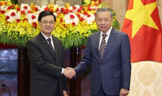 Chủ tịch nước Tô Lâm và Trưởng Khu hành chính đặc biệt Hong Kong (Trung Quốc) Lý Gia Siêu. Ảnh: Hải Nguyễn
