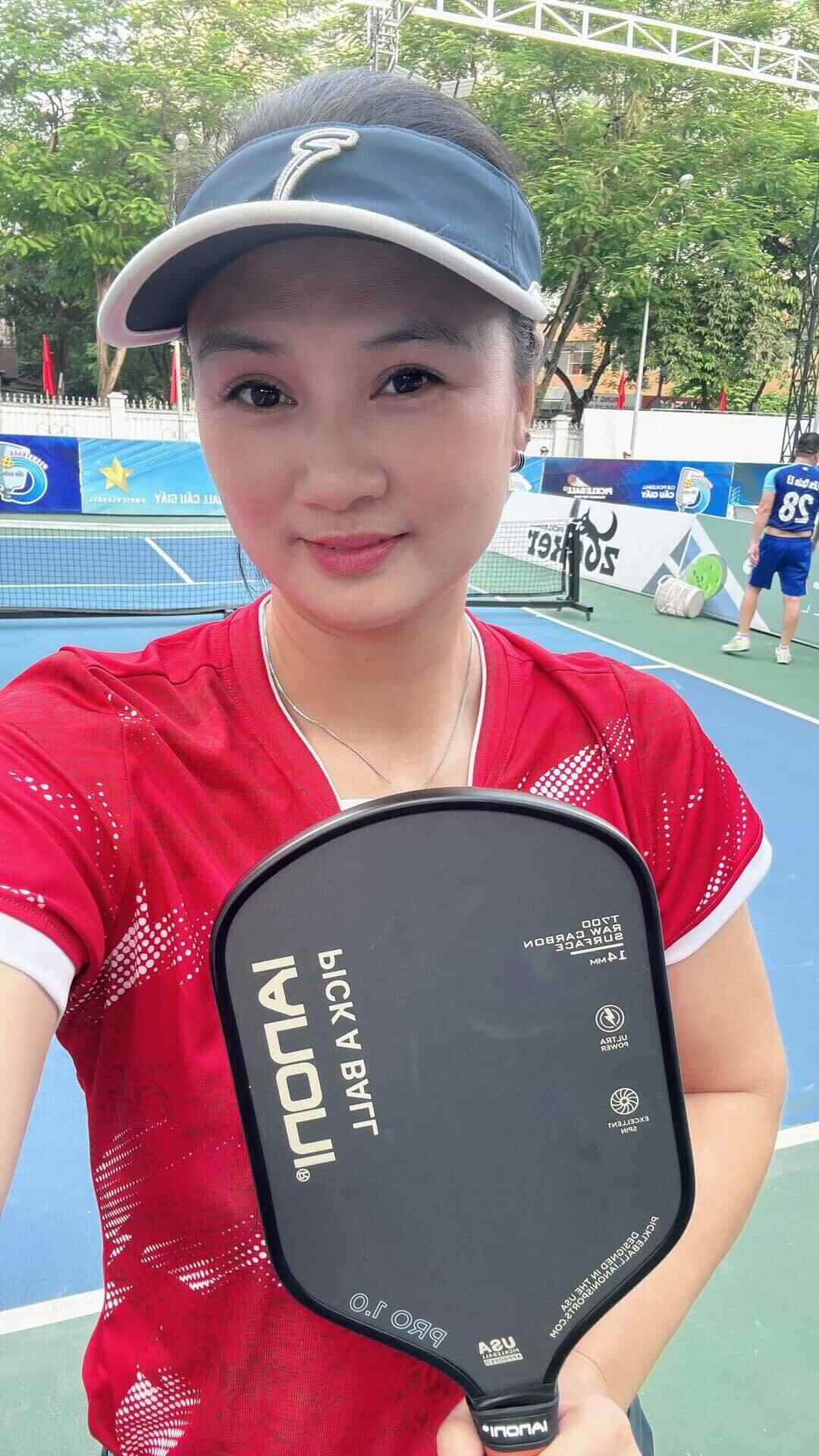 Kim Huệ playing pickle-ball. Image: Screenshot