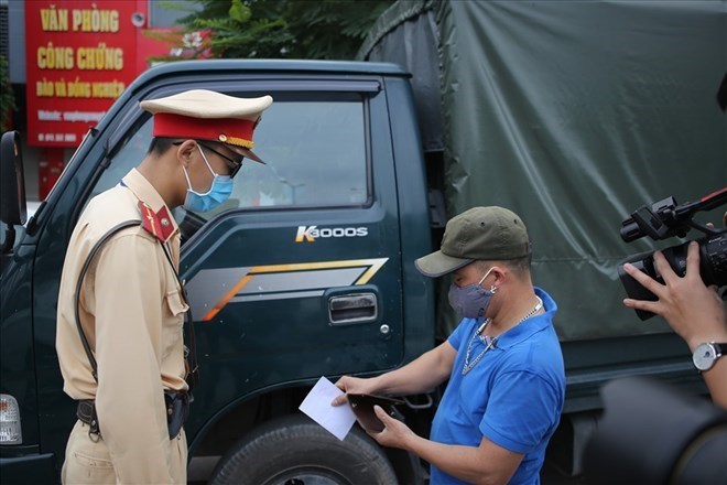 Bộ Công an đề xuất cơ chế mua tin để khuyến khích người dân tố giác vi phạm giao thông. Ảnh: Phạm Đông