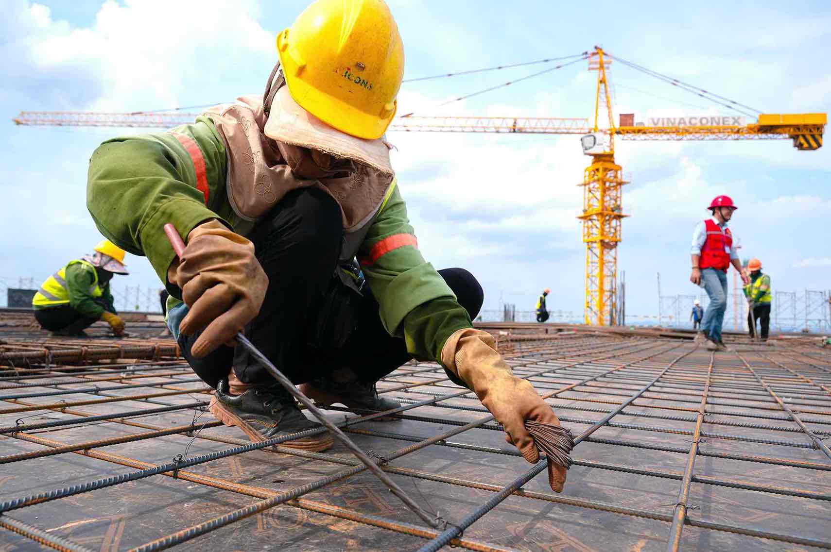 Workers construct package 5.10 of Long Thanh airport passenger terminal. Photo: Thu Phuong