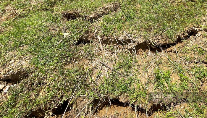 Large cracks stretching hundreds of meters are at risk of further landslides when it rains.