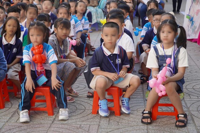 Học sinh lớp 1 Trường Tiểu học Phan Văn Trị (Quận 1, TPHCM) trong ngày tựu trường. Ảnh: Chân Phúc