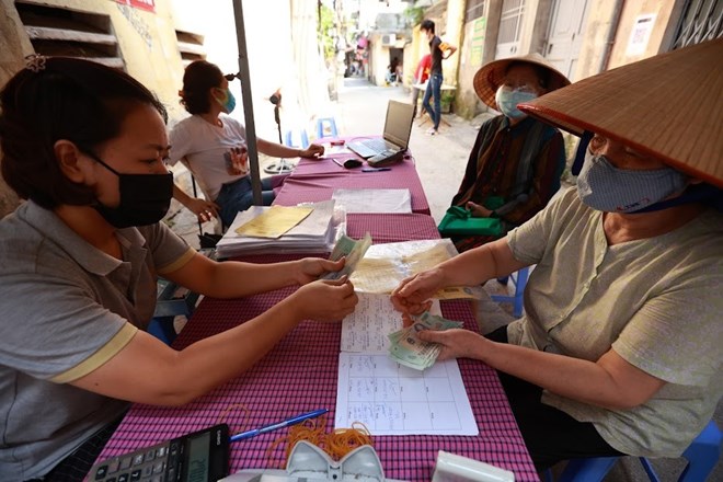 Người lao động nghỉ hưu nếu thuộc đối tượng được tăng lương khi cải cách tiền lương sau năm 2026 có thể tiếp tục được tăng lương hưu. Ảnh minh họa: Hải Nguyễn.

