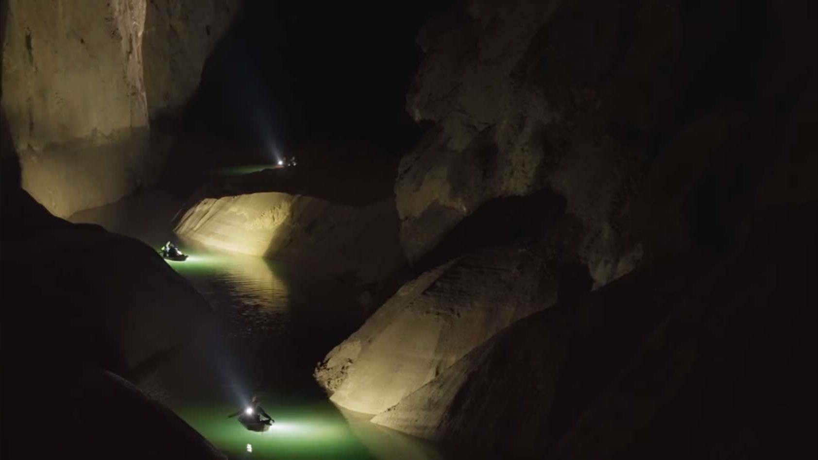 Underground river system inside the cave. Photo: Cut from video