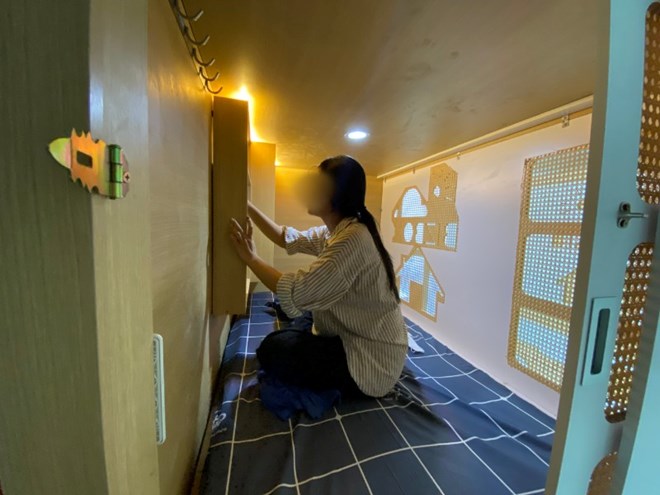 Minimum amenities inside a 3-5m2 matchbox motel in Hanoi. Photo: Mai Linh