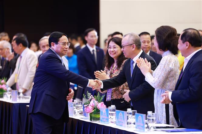 Prime Minister Pham Minh Chinh and delegates at the opening session. Photo: TTXVN