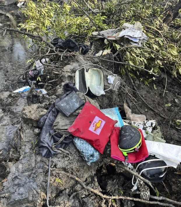 Passengers' personal belongings at the scene of the plane crash. Photo: Chachoengsao Department of Foreign Affairs