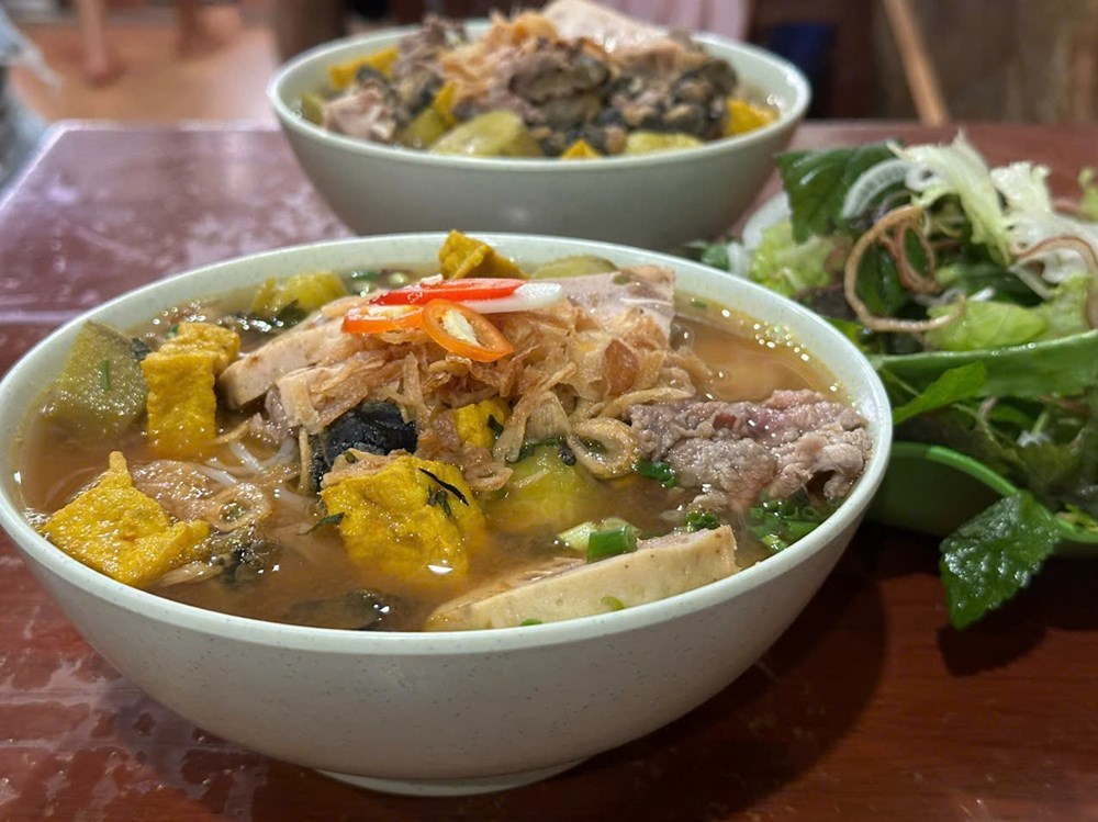 Ba Luong's snail noodle soup in Khuong Thuong village. Photo: Phuong Anh