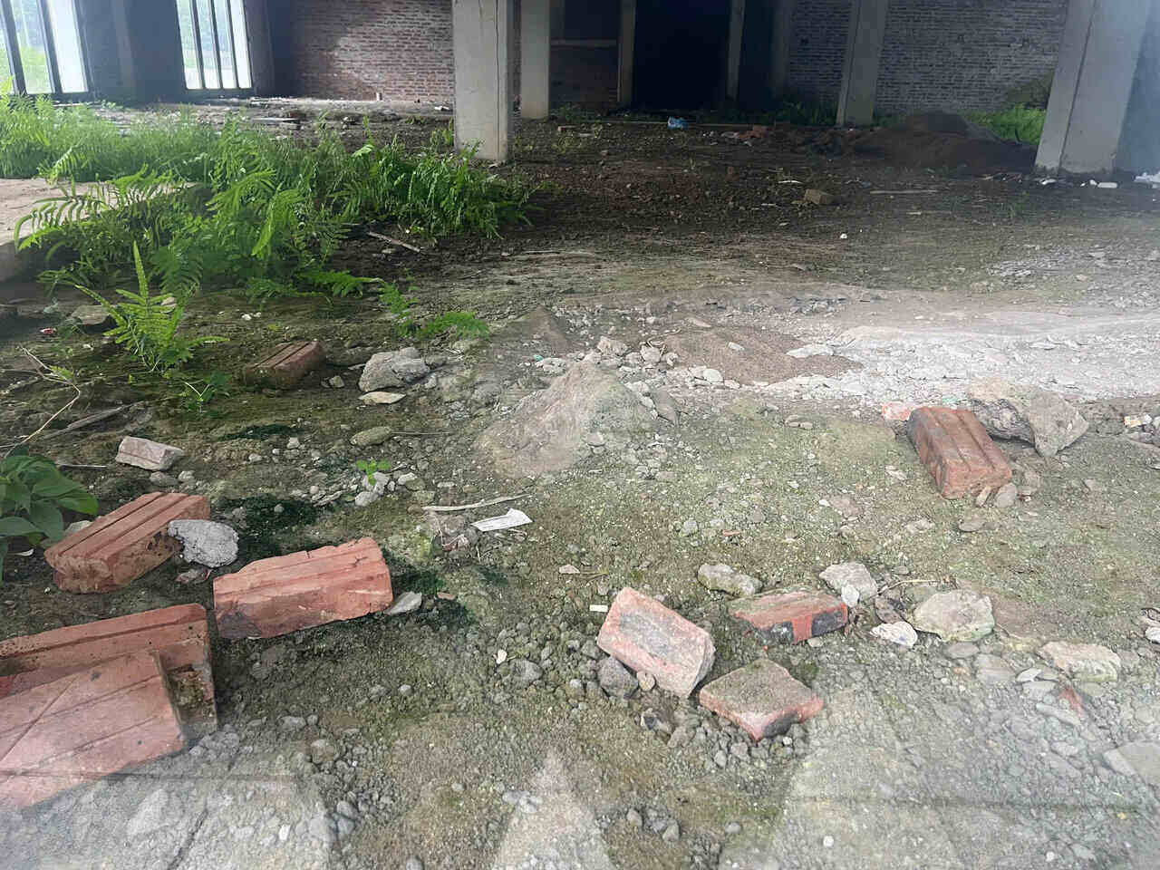 Bricks and stones are scattered in the villa areas. Photo: Dang Tinh