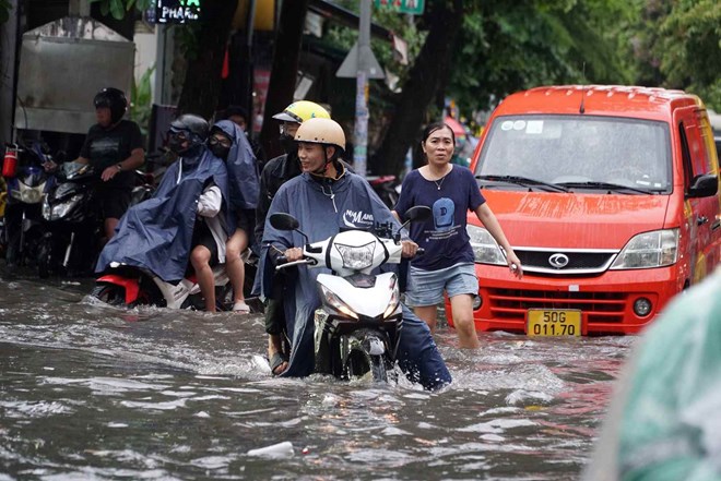 It is forecasted that many places in the Southern region will experience flooding due to heavy thunderstorms. Photo: Minh Quan