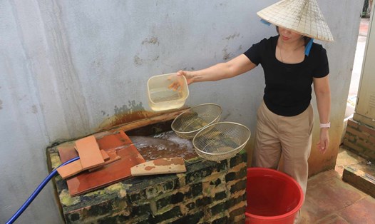 Người dân sinh sống tại Khu đất 6,9ha mòn mỏi chờ nước sạch. Ảnh: Khánh An