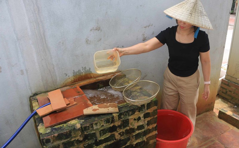 Người dân sinh sống tại Khu đất 6,9ha mòn mỏi chờ nước sạch. Ảnh: Khánh An
