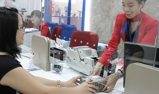 Tăng trưởng tín dụng vẫn chậm trong 6 tháng đầu năm. Ảnh: Bảo Chương