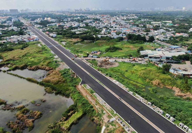 The parallel road to National Highway 50 will open to traffic on December 31, 2024. Photo: Minh Quan