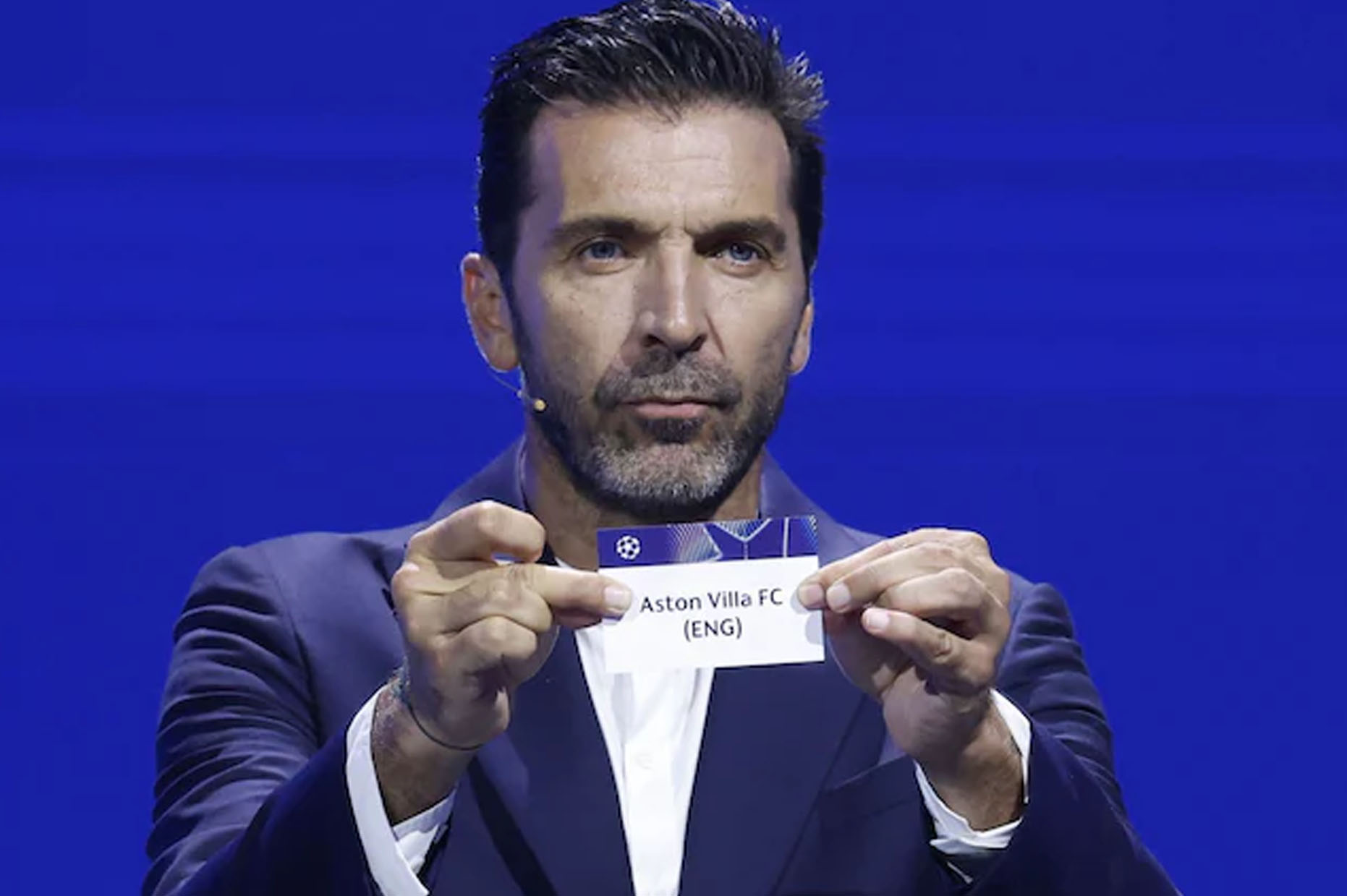 The draw in Gianluigi Buffon's hand has decided Aston Villa's fate in this season's Champions League. Photo: UEFA