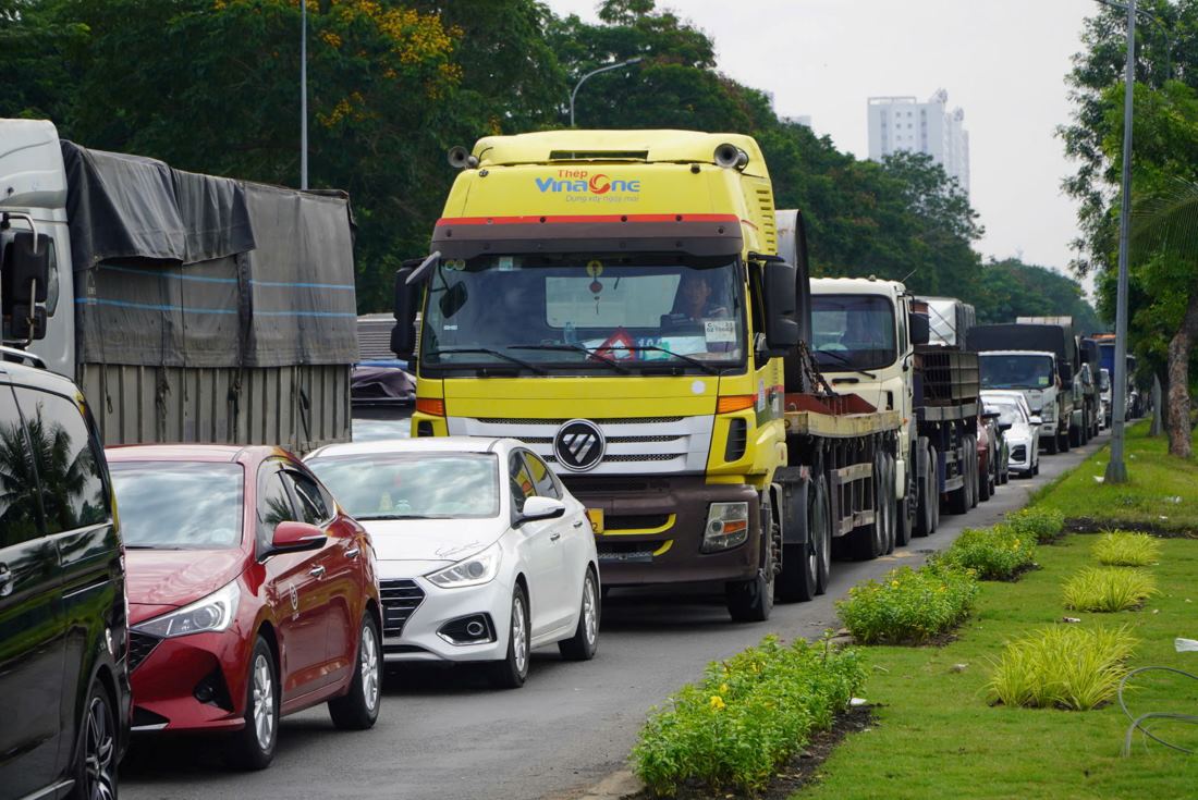 Traffic congestion stretched across the car lane.