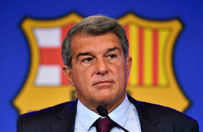 President Joan Laporta has not been able to help Barca escape financial barriers. Photo: AFP