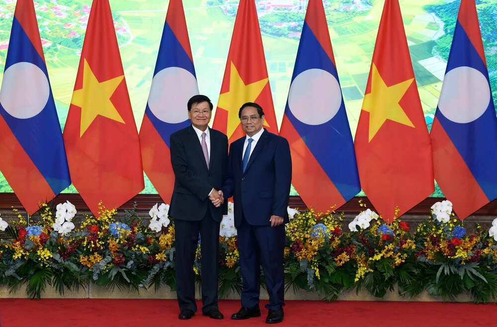 Thủ tướng Chính phủ Phạm Minh Chính hội kiến với Tổng Bí thư, Chủ tịch nước Lào Thongloun Sisoulith. Ảnh: Hải Nguyễn