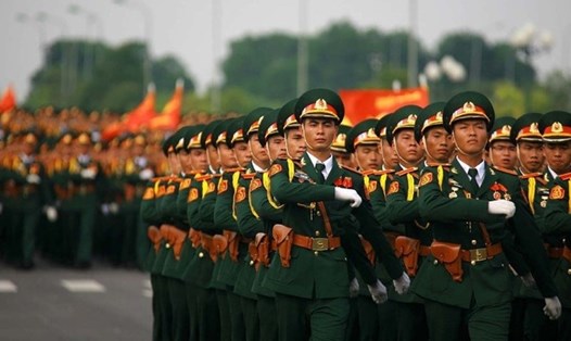 Lương cán bộ, công chức, lực lương vũ trang sẽ thay đổi khi bãi bỏ lương cơ sở. Ảnh: LDO