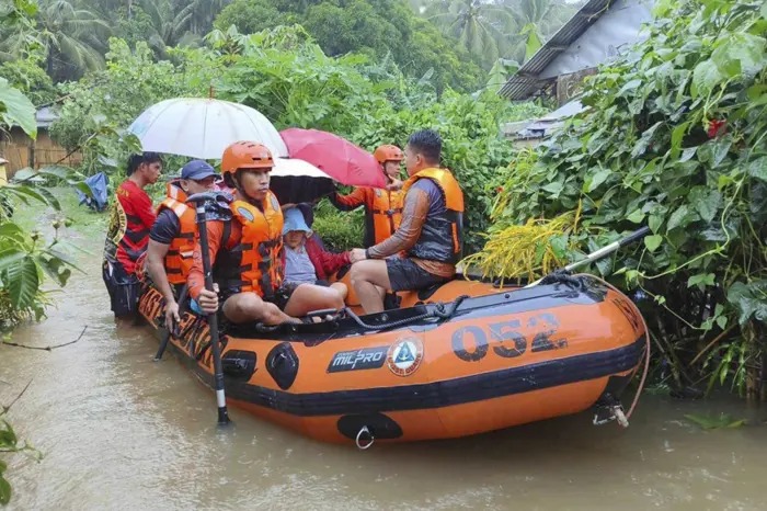 Rescuers use rubber boats as they evacuate residents to higher ground following floods caused by Tropical Storm Yagi in Allen, Northern Samar province, Philippines on September 1. Photo: Philippine Coast Guard