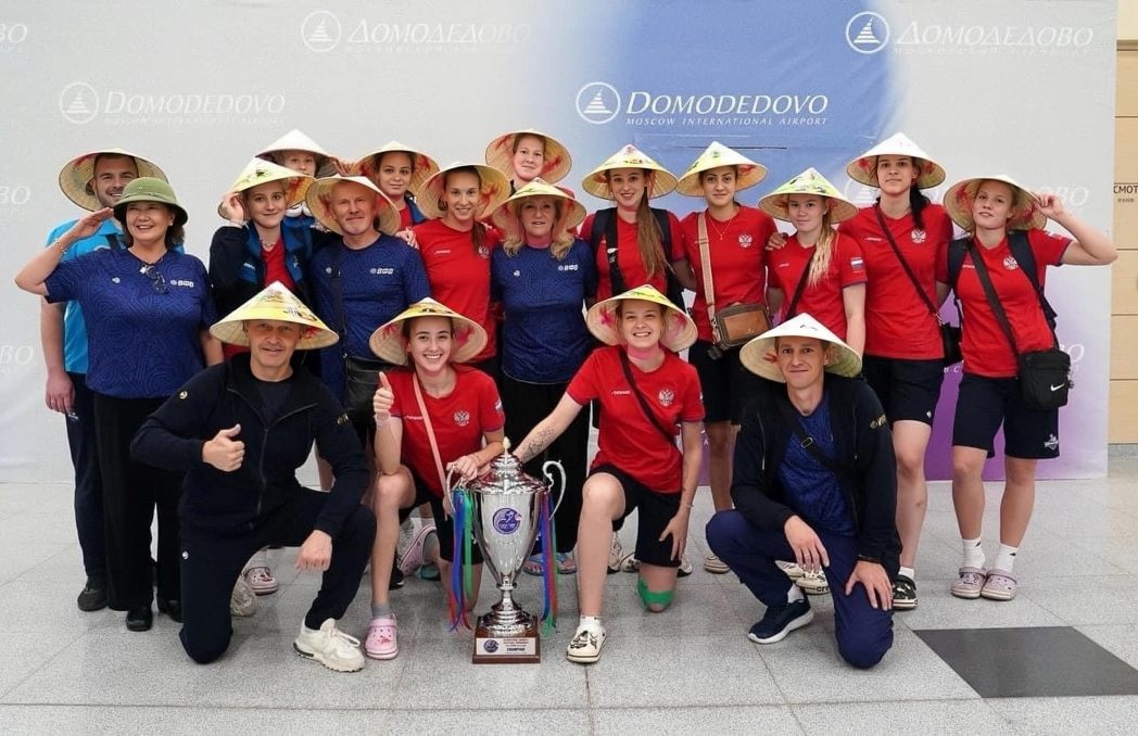 Korabelka wears a Vietnamese conical hat and a pith helmet when landing in Moscow. Photo: Korabelka