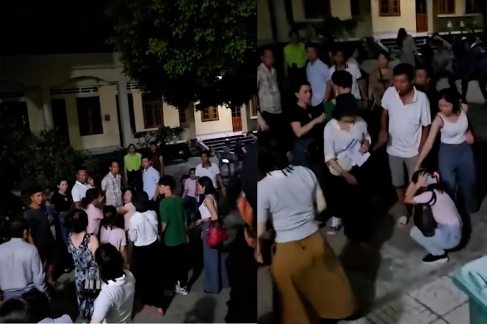 Một người phụ nữ tham gia đấu giá đất bị đánh ngay tại trụ sở UBND thị trấn Cát Tiến (huyện Phù Cát, Bình Định). Ảnh chụp màn hình