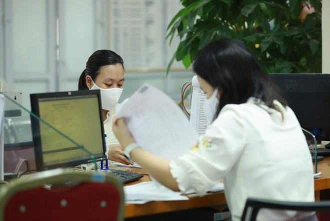 The Ministry of Finance is re-evaluating the family deduction level following recommendations from voters from six provinces and cities. Photo: Hai Nguyen