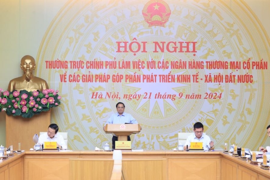 Thuong truc Chinh phu lam viec voi cac ngan hang thuong mai co phan. Anh: Nhat Bac