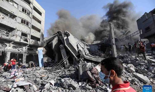 Khu vực ở Gaza bị tàn phá nặng nề sau cuộc không kích của Israel. Ảnh: Xinhua