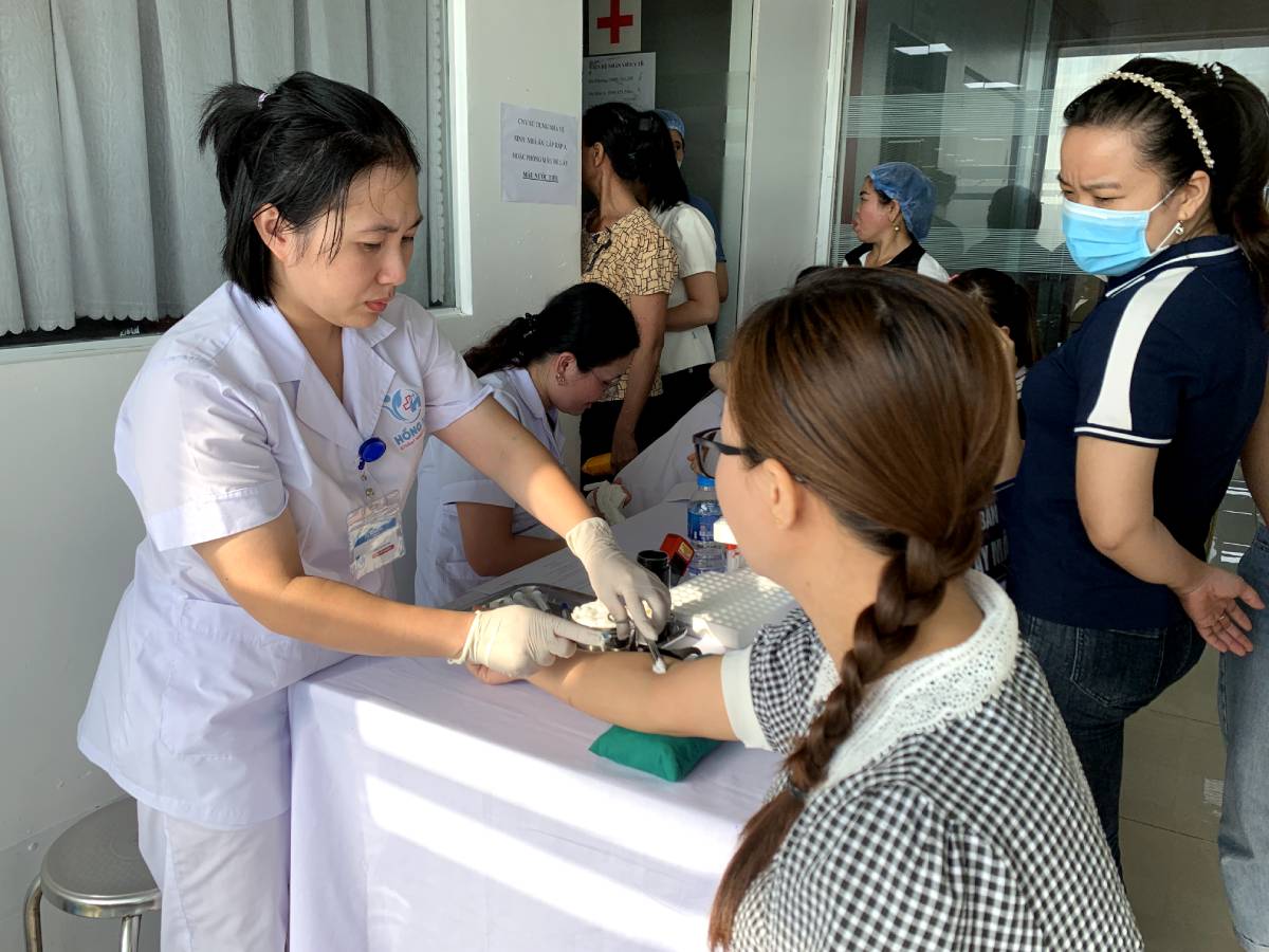 Công nhân lao động nữ tại Công ty TNHH Dream Plastic (huyện Trực Ninh, tỉnh Nam Định) tham gia mô hình "sức khỏe của bạn". Ảnh: Lương Hà