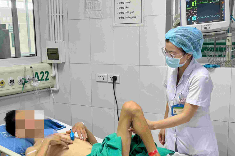 Exhausted patient after drinking alkaline water to purify body. Photo: Thang Dang